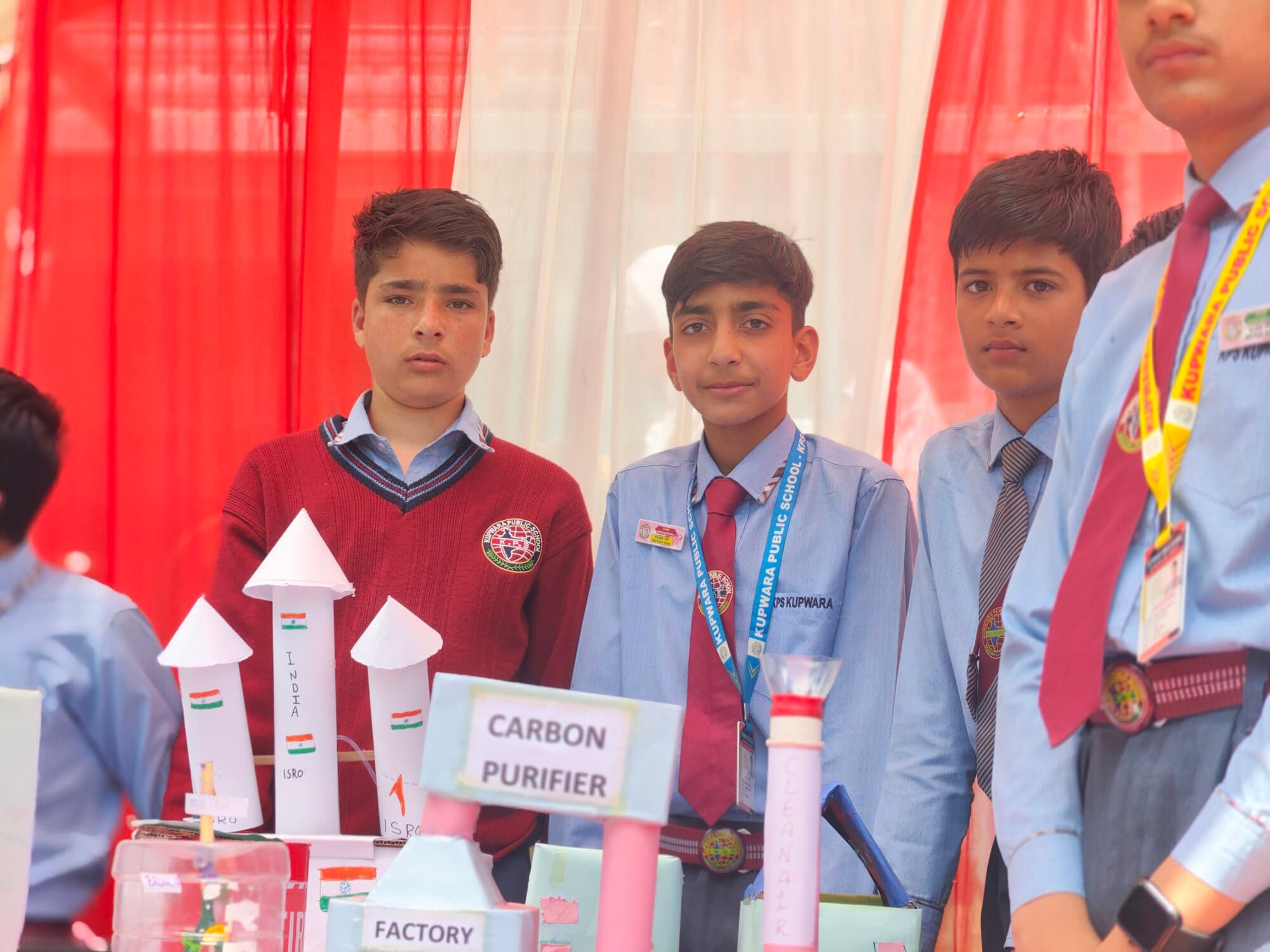 Fayaz-KPS students presenting a carbon-purifier project