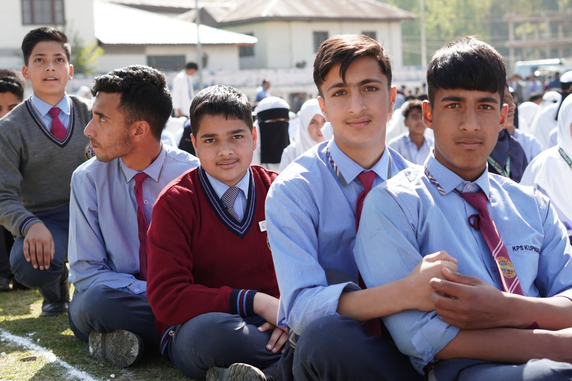 Students chatting together on the school ground